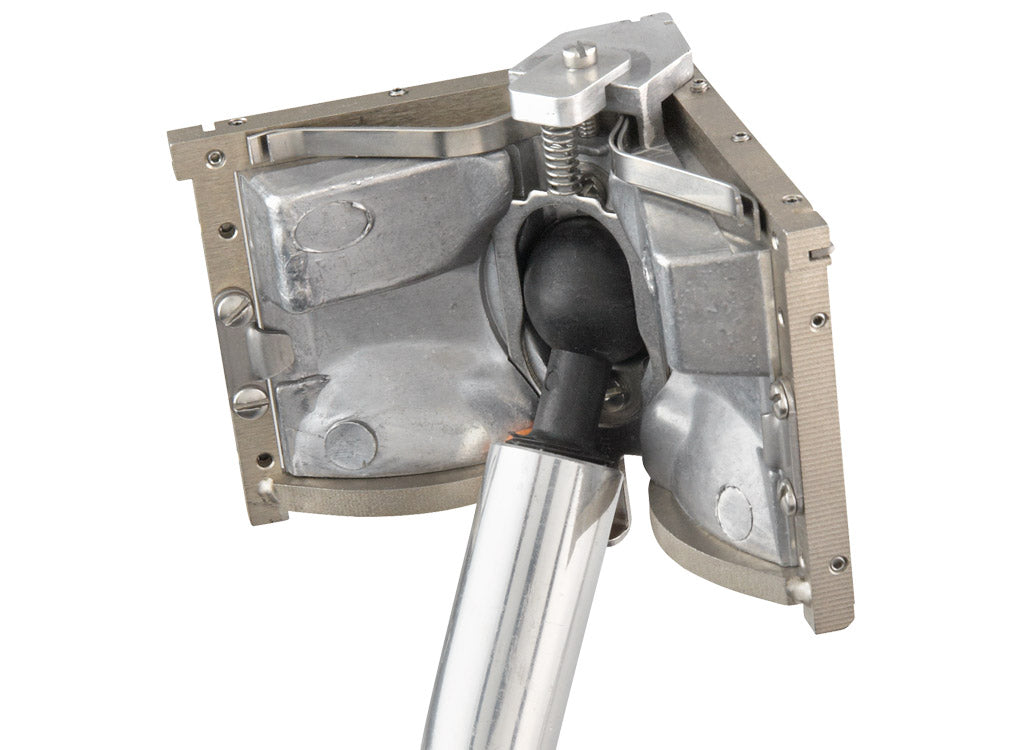 Close-up of TapeTech Corner Finisher attached to a handle with a black corner finisher adapter