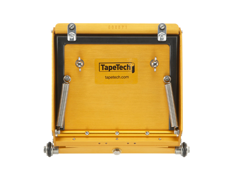 Back view of 7-inch TapeTech MAXXBOX Extra High Capacity Flat Box with gold aluminum body, brass blade holder, and crown control