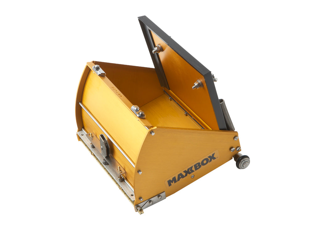 Open 10-inch TapeTech MAXXBOX Extra High Capacity Flat Box with gold aluminum body, brass blade holder, and crown control