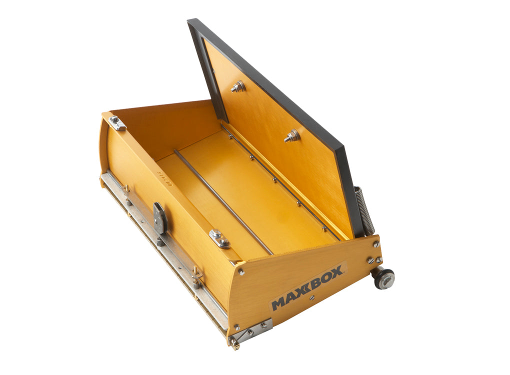 Open 12-inch TapeTech MAXXBOX Extra High Capacity Flat Box with gold aluminum body, brass blade holder, and crown control