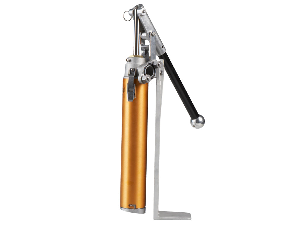 TapeTech 76TT-CA EasyClean Loading Pump with a gold body, grey leg and components, and a black handle, left side