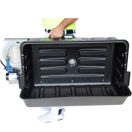 Person carrying TapeTech Mobile Wash Station from the table handle with black wash basin, hose, and sprayer attached