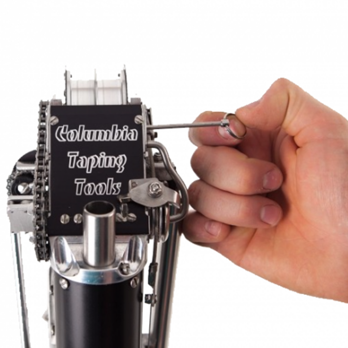 Close-up of hand repairing the Columbia Sawed Off Automatic Taper head using a pin