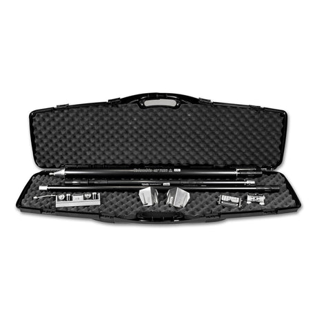 Open black foam-lined carrying case containing a Columbia compound tube, handles, flushers, applicators, corner roller, and angle head adaptor